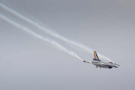 RADOM, POLAND - AUGUST 23: Belgian Air Force F-16 makes its show during Air Show Radom on August 23,...
