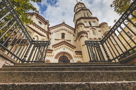 Domes of Our Lady of the Sign Church, the orthodox church between trees in Vilnius, Lithuaniaのeditorial素材