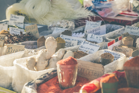 Vivid oriental central asian market with bags full of various spices in Osh bazar in Bishkek, Kyrgyzstan.の写真素材