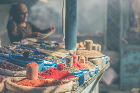 Vivid oriental central asian market with bags full of various spices in Osh bazar in Bishkek, Kyrgyzstan.のeditorial素材