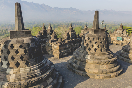 Buddist temple Borobudur on sunset background. Yogyakarta. Java, Indonesiaの写真素材