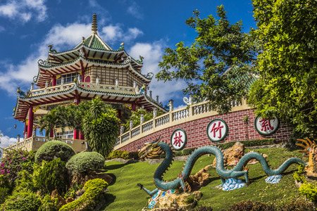 Pagoda and dragon sculpture of the Taoist Temple in Cebu, Philippines.の写真素材