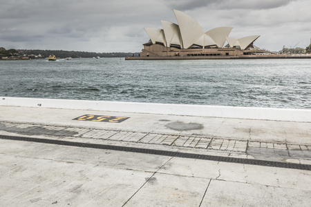 SYDNEY - OCTOBER 25: Sydney Opera House in cloudy day view on October 25, 2015 in Sydney, Australia. The Sydney Opera House is a famous arts center.のeditorial素材