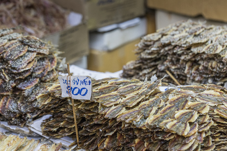 Dried seafood on sale in a thai street market in Bangkok, Thailandの写真素材