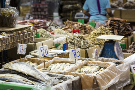Dried seafood on sale in a thai street market in Bangkok, Thailandの写真素材