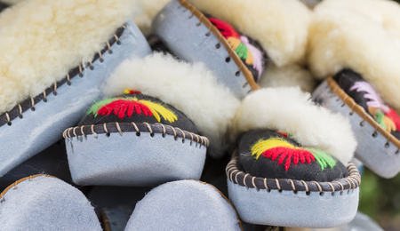 Traditional polish leather mountain boots for children called 'kierpce'の写真素材