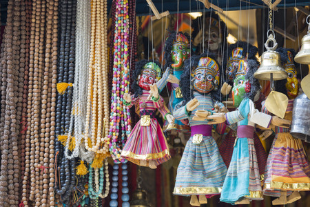 Masks, dolls and souvenirs in street shop at Durbar Square in Kathmandu, Nepal.のeditorial素材