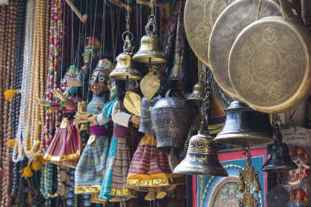 Masks, dolls and souvenirs in street shop at Durbar Square in Kathmandu, Nepal.のeditorial素材