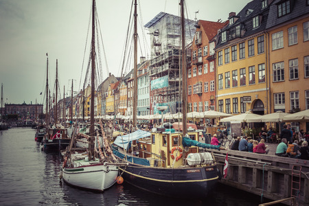 COPENHAGEN - SEPTEMBER 07: Yachts in NYHAVN on September 07, 2014 in Copenhagen, Denmark. NYHAVN - favourite vacation spot of tourists and fans of a herring.のeditorial素材