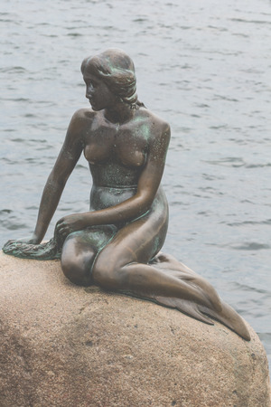 COPENHAGEN, DENMARK - SEPTEMBER,07: A famous statue of the little Mermaid in Copenhagen, Denmark on September 07, 2014のeditorial素材