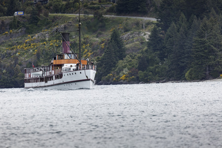 QUEENSTOWN, NZ - NOV 12:TSS Earnslaw on November 15 2014.It's one of the oldest tourist attractions in Otago and the only remaining commercial passenger coal-fired steamship in the southern hemisphere.のeditorial素材
