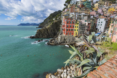 Riomaggiore fisherman village in a dramatic windy weather. Riomaggiore is one of five famous...