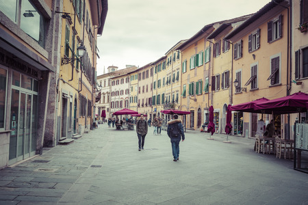 PISA, ITALY - MARCH 10, 2016: People visit Old Town of Pisa, Italy. Pisa has population of 90 thousand people and is a popular tourism destination in Tuscany.のeditorial素材