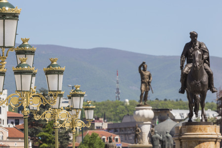 SKOPJE, MACEDONIA - APRIL 14, 2016: Square Makedonia, the capital's main square, with people passing by and Alexander the Great statueのeditorial素材