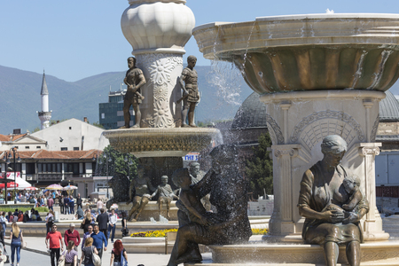 SKOPJE, MACEDONIA - APRIL 14, 2016: Square Makedonia, the capital's main square, with people passing by and Alexander the Great statueのeditorial素材
