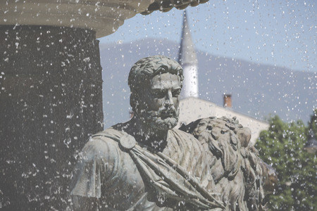 Large water fountain and bronze sculptures of adults and children in Skopje, Macedonia, Europe.のeditorial素材