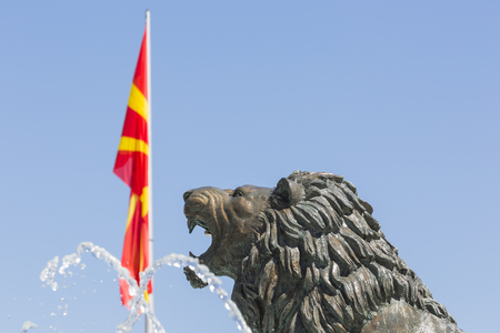Lion Statue and Macedonian Flag, Skopje, Macedoniaのeditorial素材