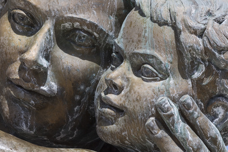 Large water fountain and bronze sculptures of adults and children in Skopje, Macedonia, Europe.のeditorial素材