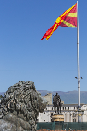 Lion Statue and Macedonian Flag, Skopje, Macedoniaのeditorial素材