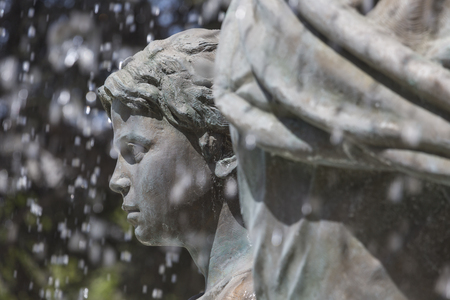 Large water fountain and bronze sculptures of adults and children in Skopje, Macedonia, Europe.のeditorial素材