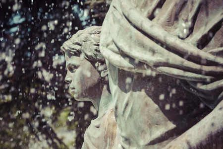 SKOPJE, MACEDONIA - APRIL 14, 2016: Large water fountain and bronze sculptures of adults and children in Skopje, Macedonia, Europe.のeditorial素材