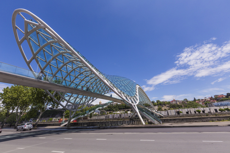 TBILISI, GEORGIA - MAY 07: The Bridge of Peace is a bow-shaped pedestrian bridge over the Kura River in Tbilisi, capital of Georgia on may 07, 2016のeditorial素材