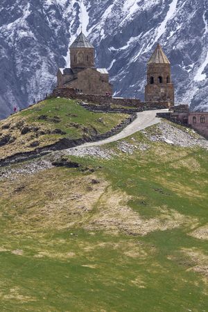 Georgia, Stepantsminda-Sameba. Ancient Gergeti Trinity Church high in the mountains.