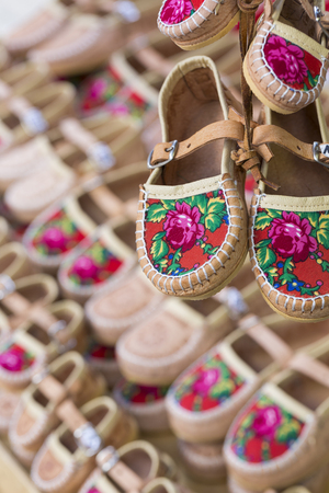 Traditional polish leather mountain boots for children called 'kierpce'の写真素材