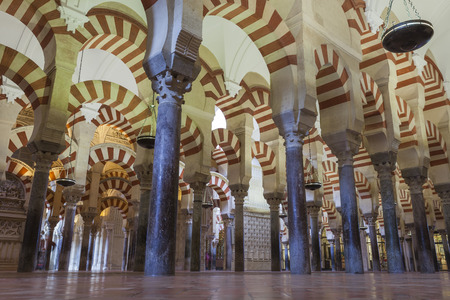 CORDOBA - SPAIN - JUNE 10, 2016 :Arches Pillars Mezquita Cordoba Spain. Created in 785 as a Mosque, was converted to a Cathedral in the 1500. 850 Columns and Archesのeditorial素材