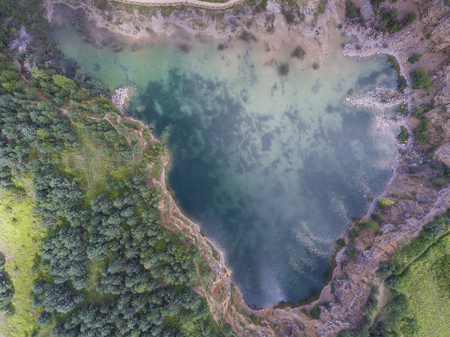 Blue laggon see from above in old sand mine in Poland.