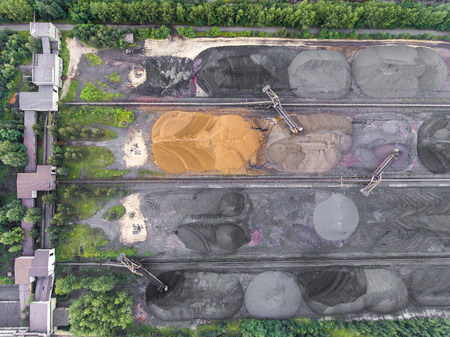 The surface mine storage place, mining minerals and brown coal in diferent colours. View from above....