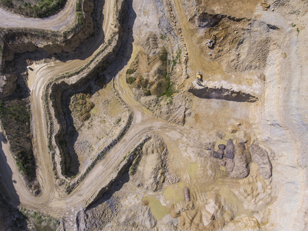 Mining quarry with special equipment, open pit excavation. Sand mine. View from above.