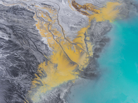 Degraded landscape in Poland. Destroyed land. View from above. Surrealistic lake.の写真素材