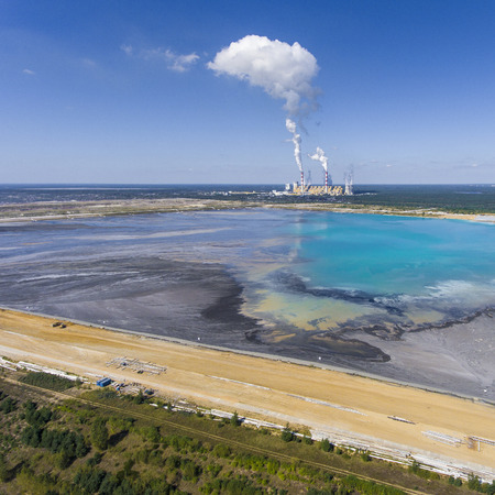 Surface coal mining and power station in Poland. Destroyed land. View from above. Surrealistic...