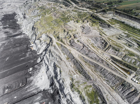 Surface coal mining in Poland. Destroyed land. View from above. Surrealistic landscape.の写真素材