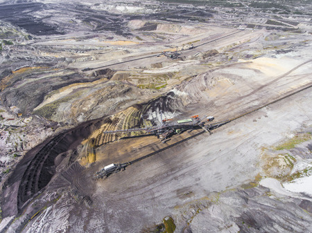 Surface coal mining in Poland. Destroyed land. View from above. Surrealistic landscape.