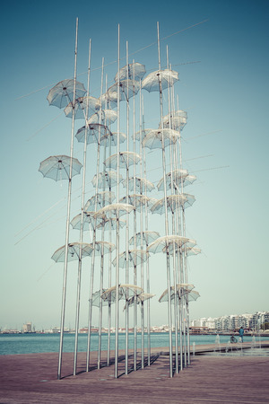 THESSALINIKI - GREECE - SEPTEMBER 23, 2016 :Unbrellas on the boardwald on Thessaloniki Greeceのeditorial素材