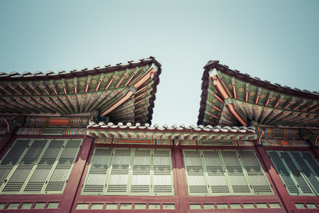 Detail of Traditional Korean Roof, Colourful Decorated Ornament for Ancient Korean Palace or Temple...