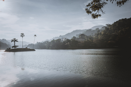Artificial lake Bogambara and Diyathilaka Mandapaya / Island of Kandy lake. Sri Lankaの写真素材