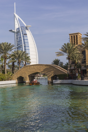 DUBAI, UAE - JANUARY 18, 2017 : Madinat Jumeirah with in the background the Burj Al Arab, Dubai, United Arab Emiratesのeditorial素材
