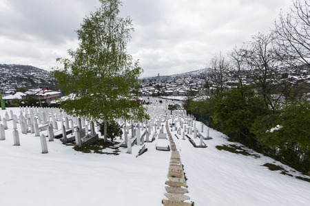A muslim cemetery in a beautiful winter day in Sarajevo, Bosnia and Herzegovina.の写真素材