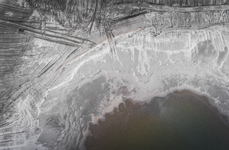 Degraded landscape in Poland. Destroyed land. View from above. Surrealistic lake.の写真素材