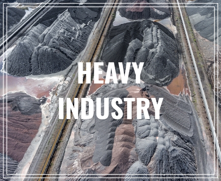 Mining excavator on the bottom surface mine. Brown coal deposits. View from above.