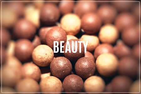 Beige cosmetics multicolor rouge balls background, macro viewの写真素材