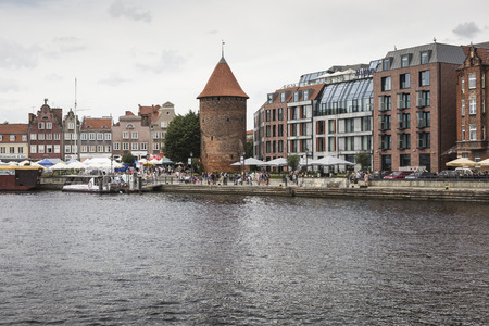GDANSK, POLAND - AUGUST 04,2017: Cityscape on the Vistula River in historic city of Gdansk, Poland.