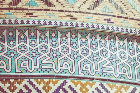 Tiled background, oriental ornaments from Amir Chakhmaq Complex in Yazd, southern Iranの写真素材