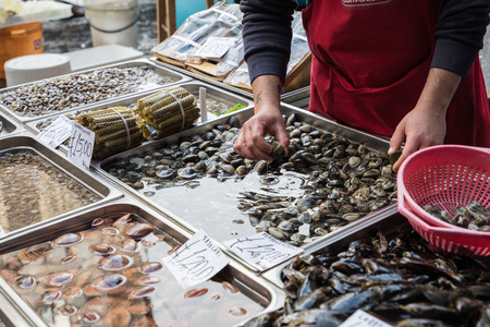 Background of mussels for sale at a fish market in Sicily, Italy.の写真素材