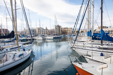 PALERMO, ITALY - NOVEMBER 29, 2017: Boats and yachts parked in La Cala bay, old port in Palermo, Sicily, Italy.のeditorial素材