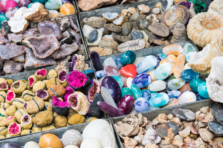 Selection of colorful minerals on a traditional Moroccan market (souk) in Marrakech, Moroccoの写真素材