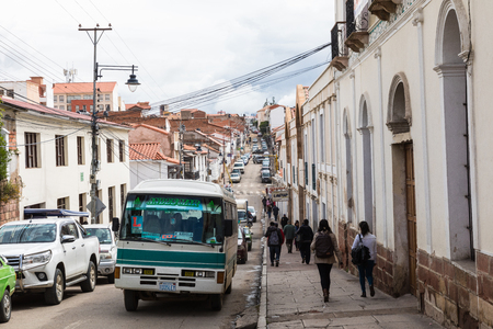 SUCRE, BOLIWIA - FEBRUARY 08, 2018: Street in Sucre. Sucre is the constitutional capital of Bolivia. Traditional colonial architecture, white houses.のeditorial素材